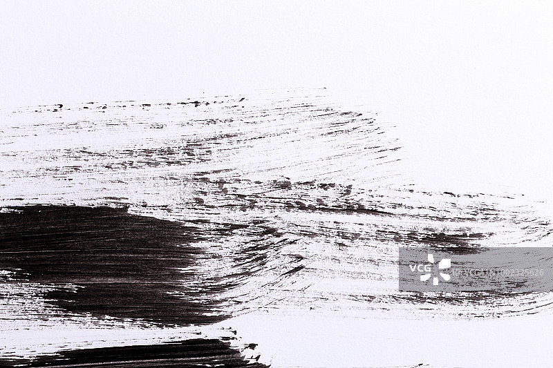 白色纸上的黑色油漆图片素材