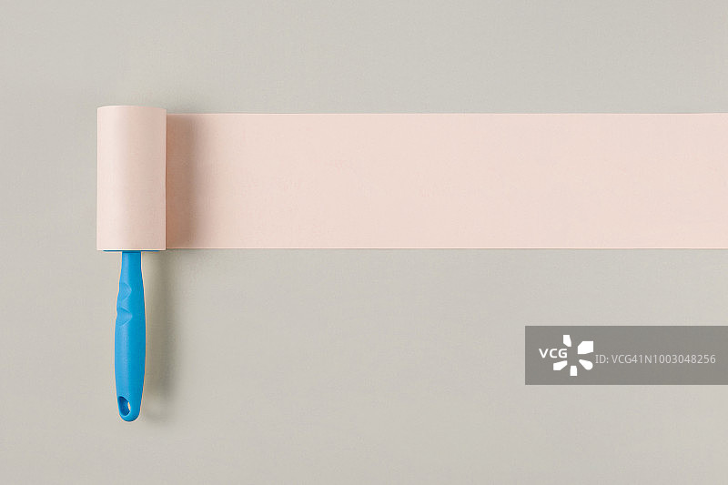 带有粘毛滚筒的概念静物图片素材