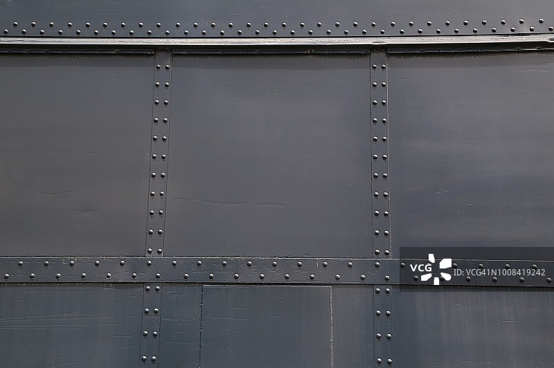 铆接在一起的金属面板完整画面图片素材