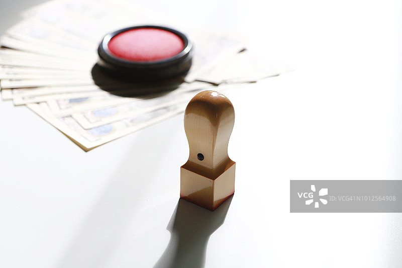 带有印泥的印章和货币图片素材