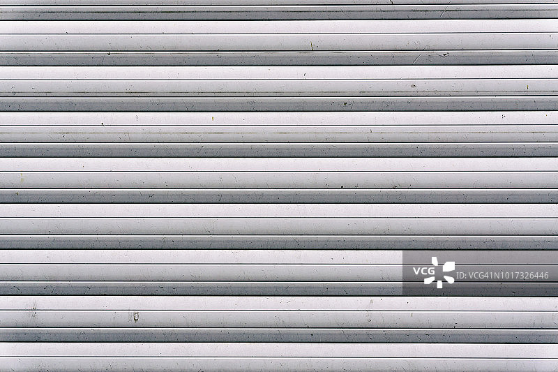 灰色波纹金属门特写图片素材