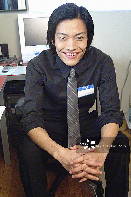 佩戴姓名牌的商人图片素材