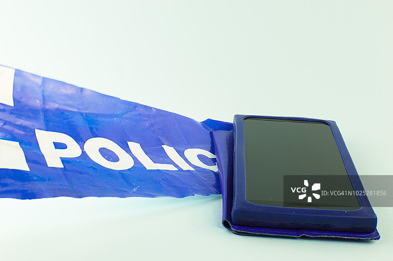 警戒线内的智能手机 - 犯罪现场图片素材