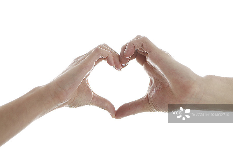 情侣用手做出心形图片素材