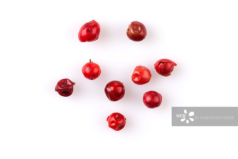 白色背景上分离的红花椒种子图片素材