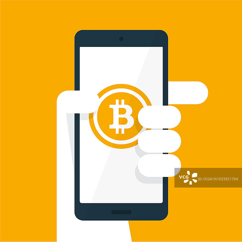 拿着一个带有比特币图标的智能手机图片素材