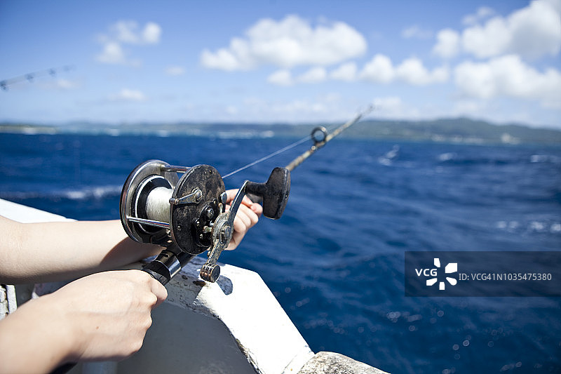 塞班岛海边的鱼竿图片素材