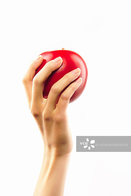 女人手持苹果图片素材