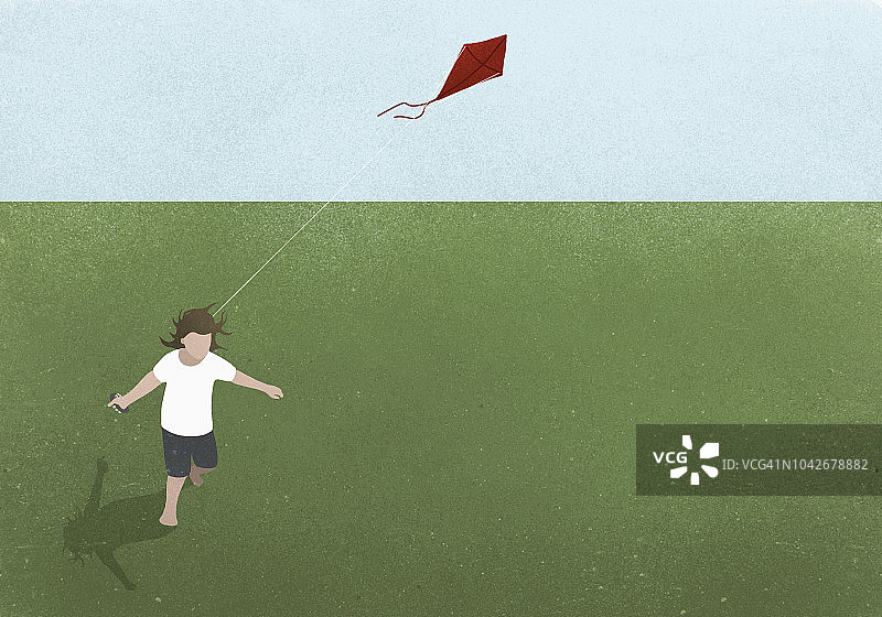 在草地上放风筝奔跑的女孩图片素材