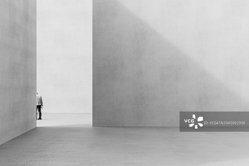 失落的商人在混凝土城市中离开图片素材