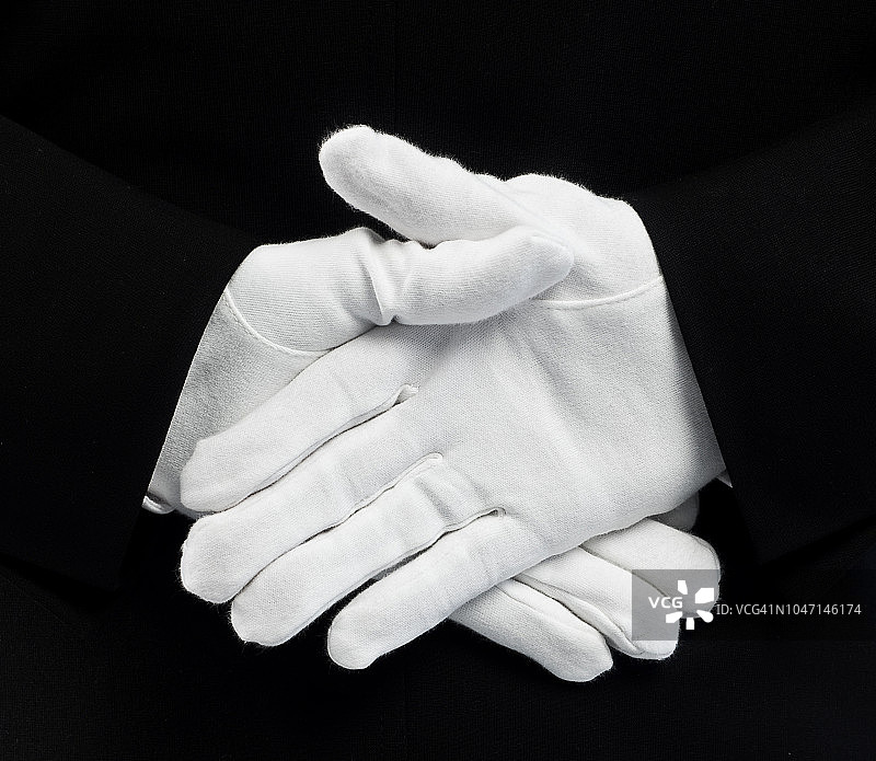 背后的白色手套图片素材
