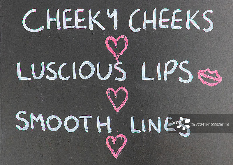 美容院外有趣的广告黑板特写图片素材