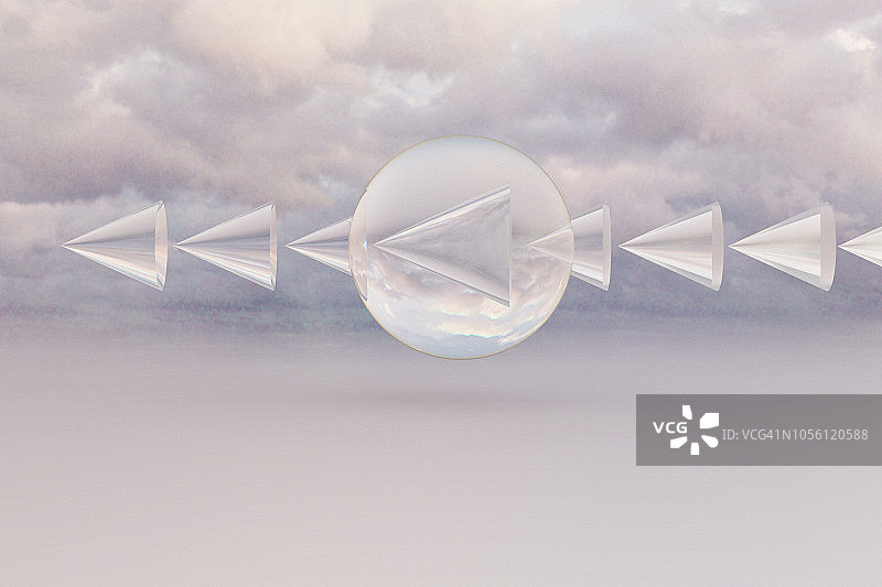 箭穿透的风景中漂浮的玻璃球体图片素材