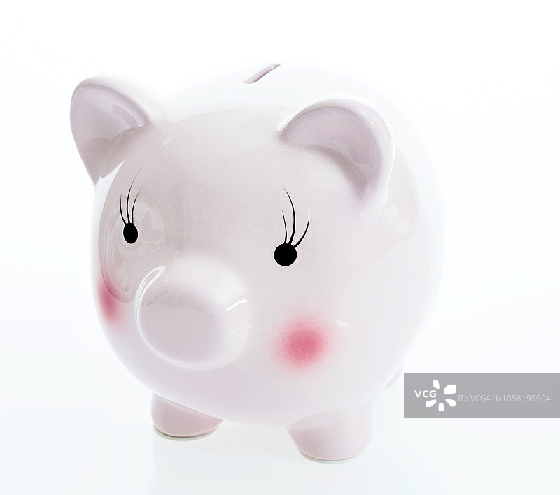 白色背景上的存钱罐图片素材