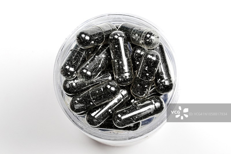 黑色胶囊药瓶高角度视图图片素材