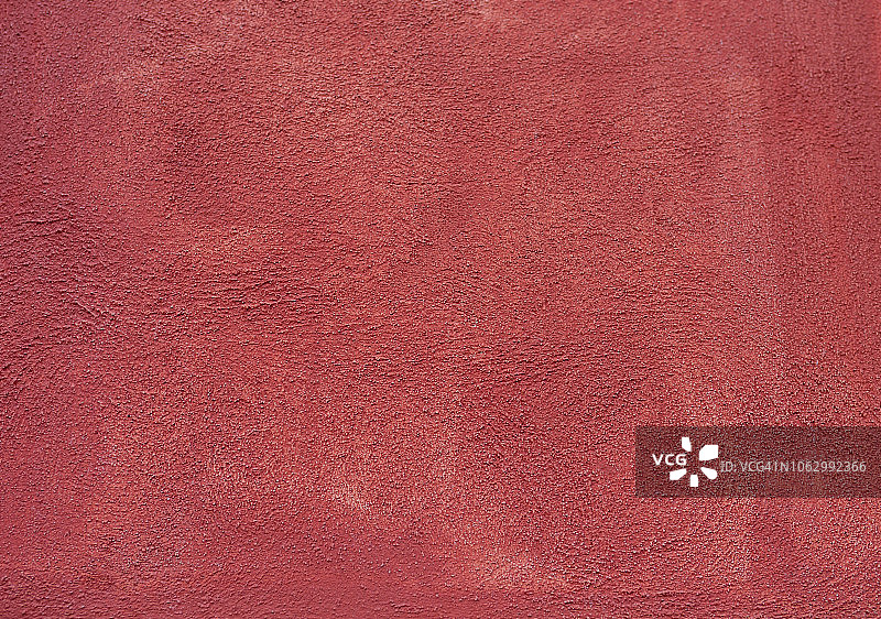 红色石膏锈迹斑斑的混凝土墙图片素材