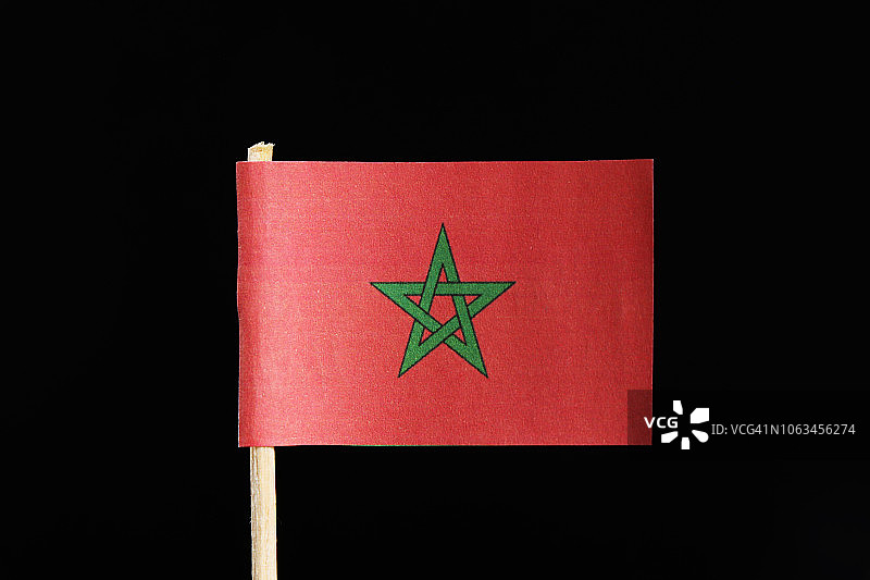 摩洛哥国旗牙签背景素材：红色背景上的绿色五角星图片素材