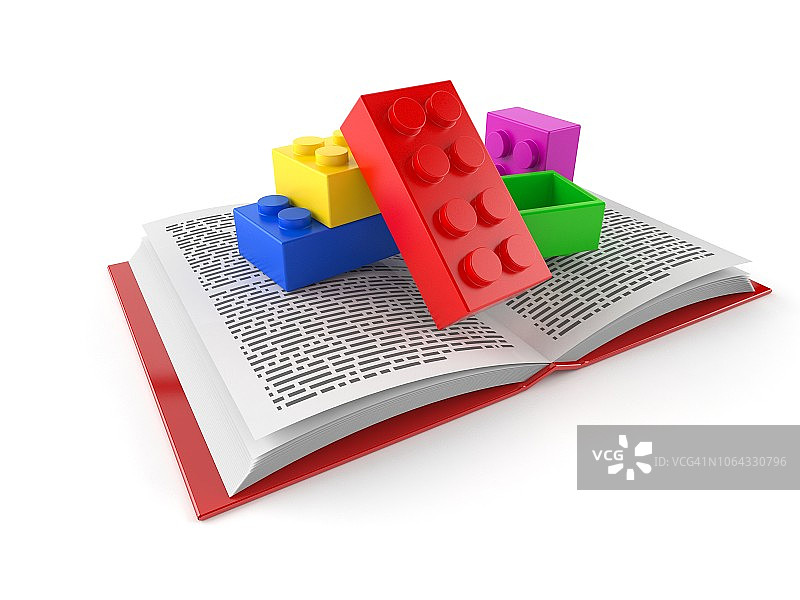 打开的书上的玩具积木图片素材