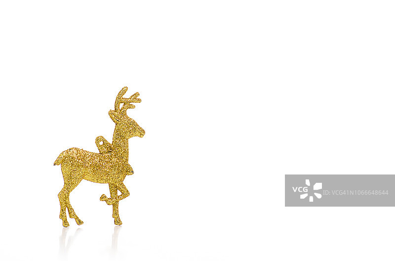 手中的圣诞玩具驯鹿图片素材