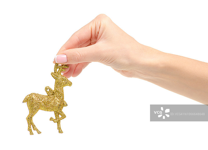 手中的圣诞玩具驯鹿图片素材