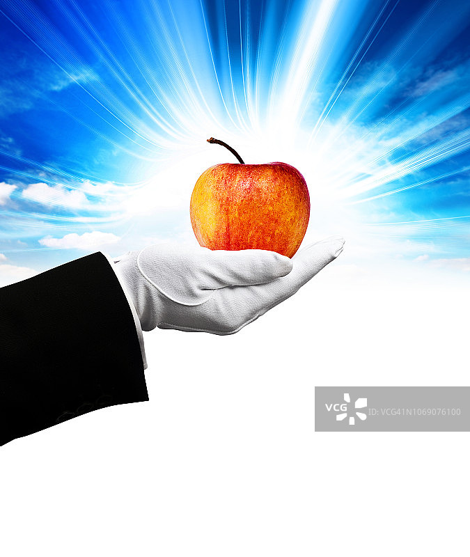 手中的红色苹果图片素材