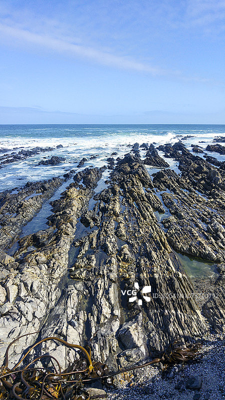 南非开普敦岩石海滩正面图片素材