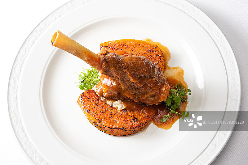 慢炖羊腿配烤南瓜图片素材