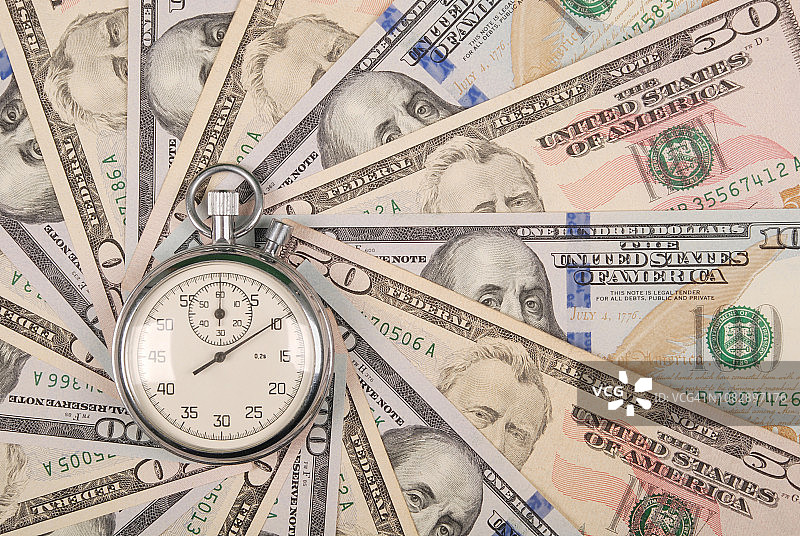 金钱万花筒上的秒表图片素材
