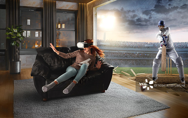 戴着VR眼镜的女人与板球的虚拟现实图片素材