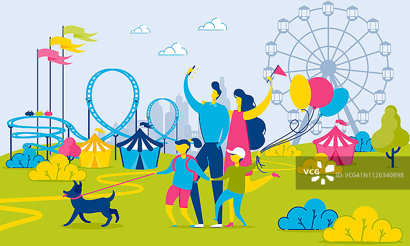 一家人在游乐园城市景观旁散步图片素材