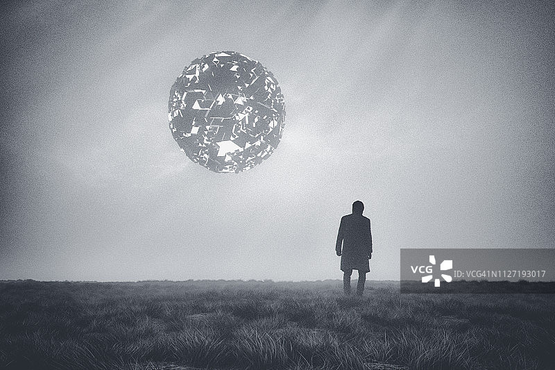 男人对抗神秘的外星不明飞行物图片素材