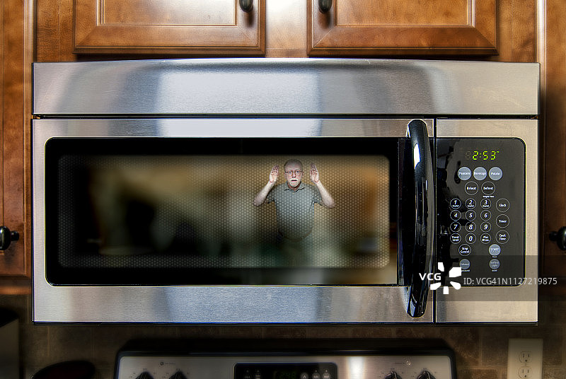 困在微波炉里图片素材