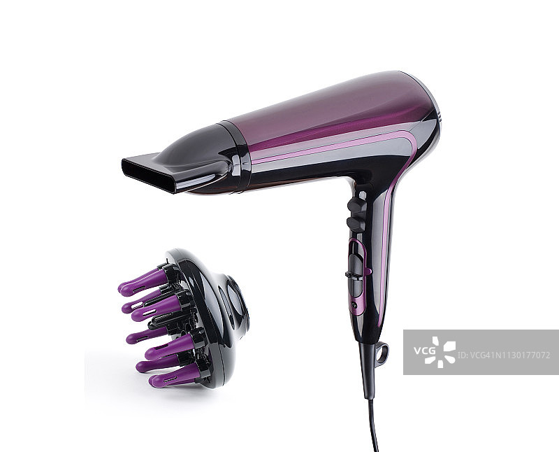 白色背景上的紫色吹风机图片素材