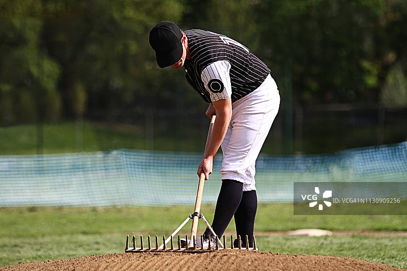 棒球运动员耙投手土墩图片素材