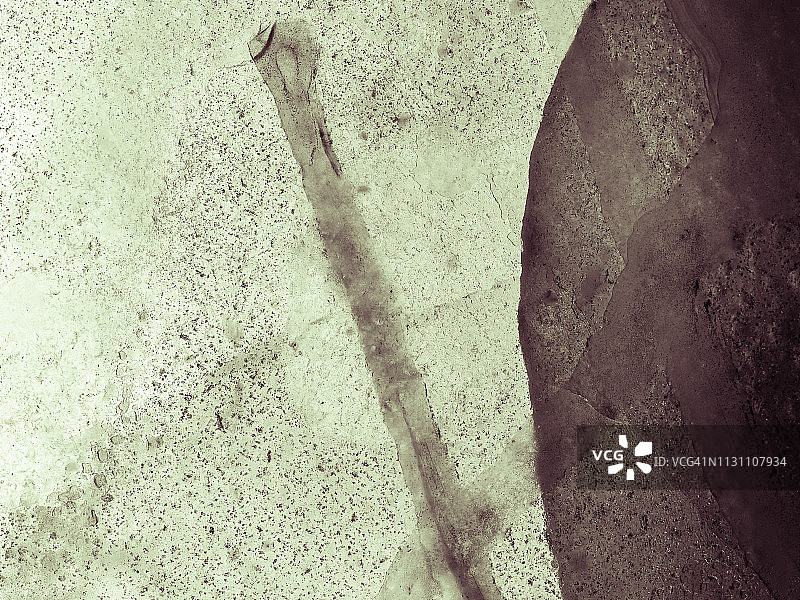 灰色和淡绿色背景上的裂冰纹理图片素材