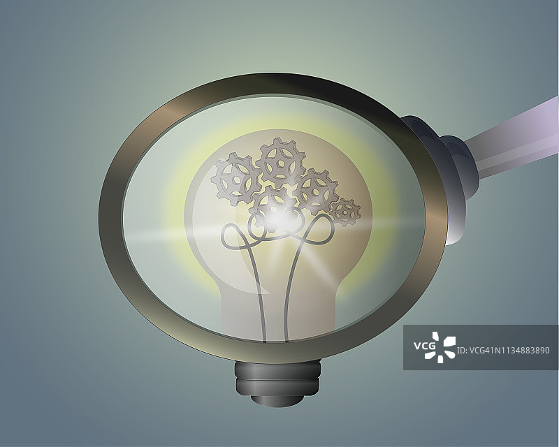 放大镜下的灯泡创意概念图片素材