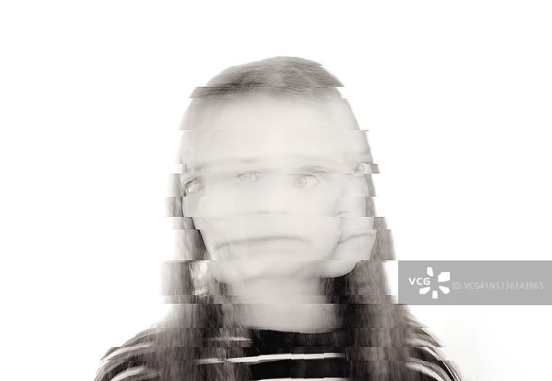 故障特效和多重曝光的严肃表情女孩图片素材