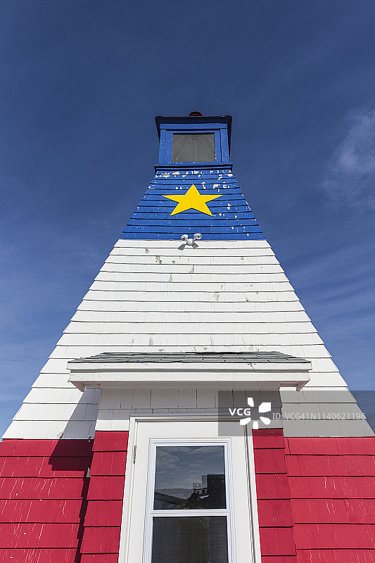 加拿大新斯科舍省卡伯特之路：谢蒂坎普镇的阿卡迪亚彩色灯塔图片素材