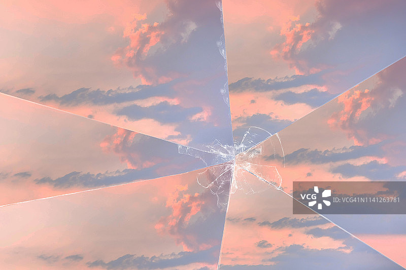 透过破镜看到的云霞日落诗意画面图片素材