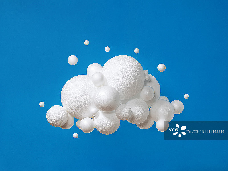 蓝色背景上的抽象云图片素材