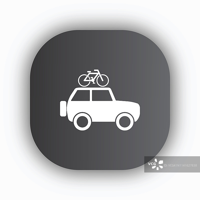 车顶行李架上带有自行车的SUV汽车图片素材