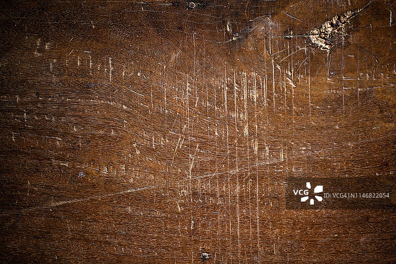 带刮痕的棕色木地板纹理图片素材