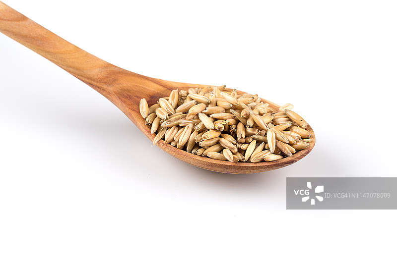 木勺中的有机燕麦颗粒图片素材