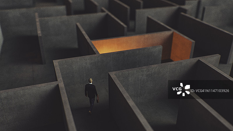 迷失在迷宫中的年轻商人图片素材