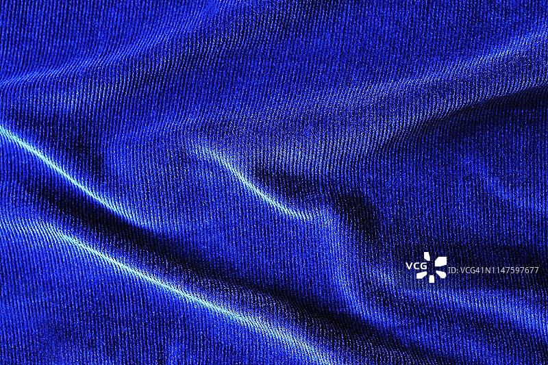 灰色亚麻布褶皱背景特写图片素材