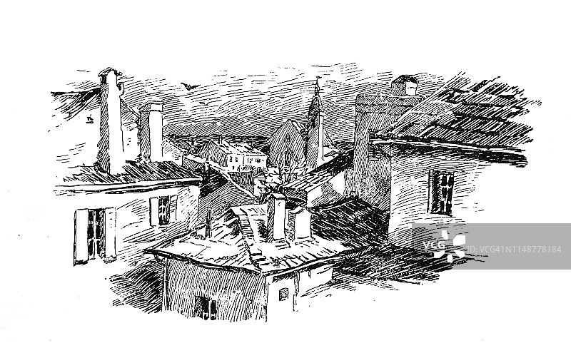 带教堂塔楼的村庄屋顶景观图片素材