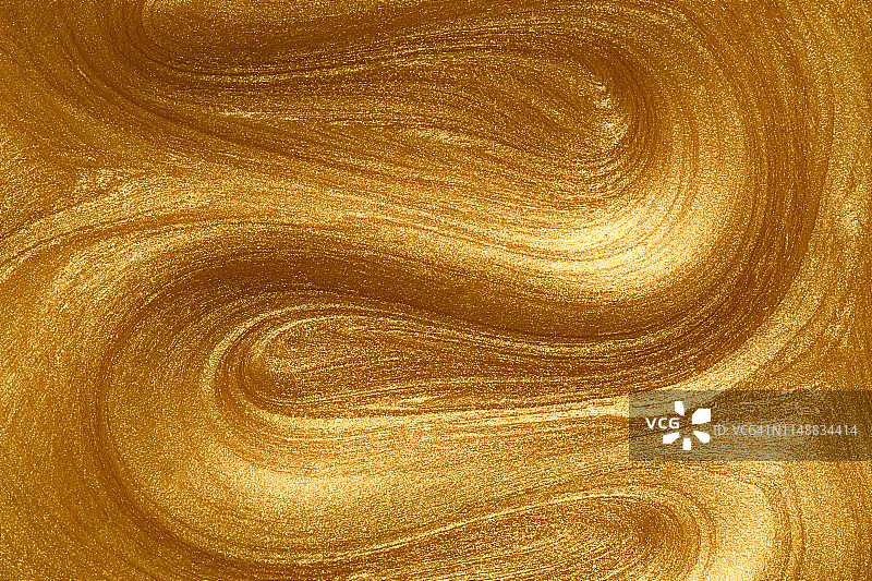 闪耀的金色颜料波浪图案图片素材