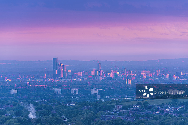 英国曼彻斯特霓虹日出图片素材
