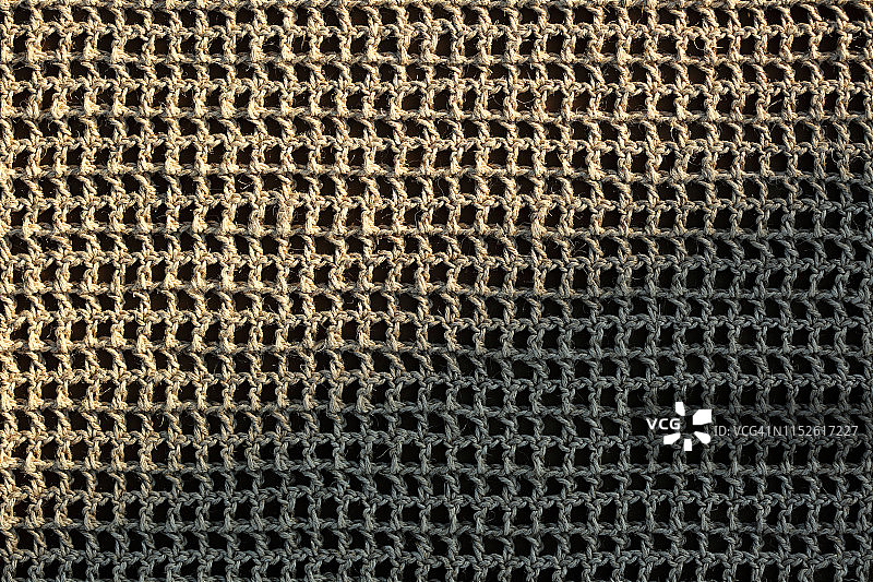 亚麻钩针编织品特写与阴影图片素材