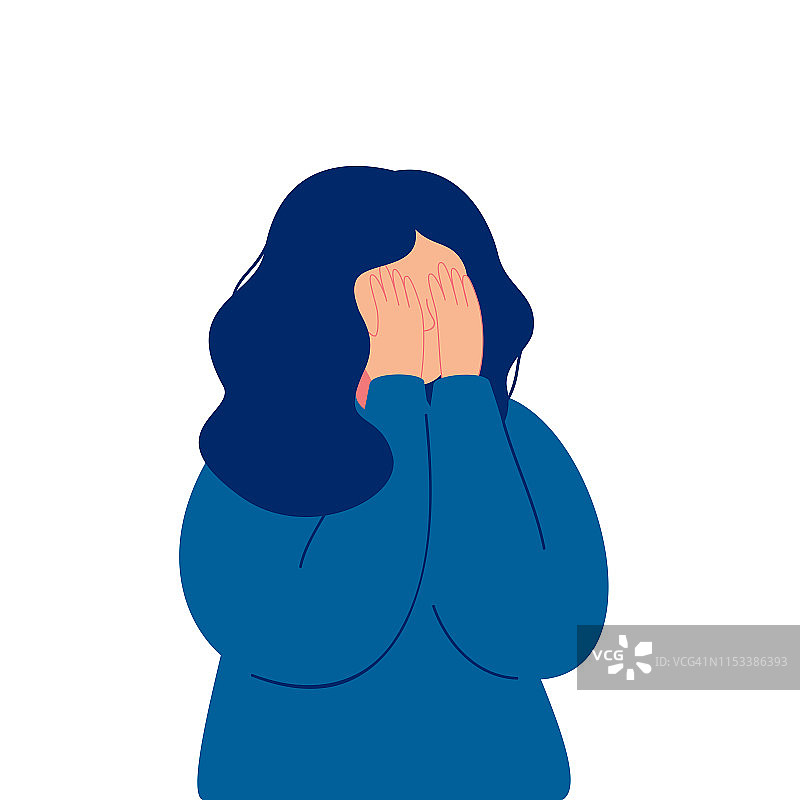 情绪低落的年轻女孩哭着，用手捂住脸图片素材